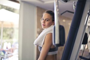 A satisfied customer using their repaired gym equipment